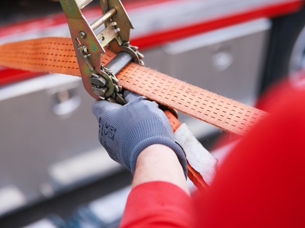 Spannen eines Transportgurtes